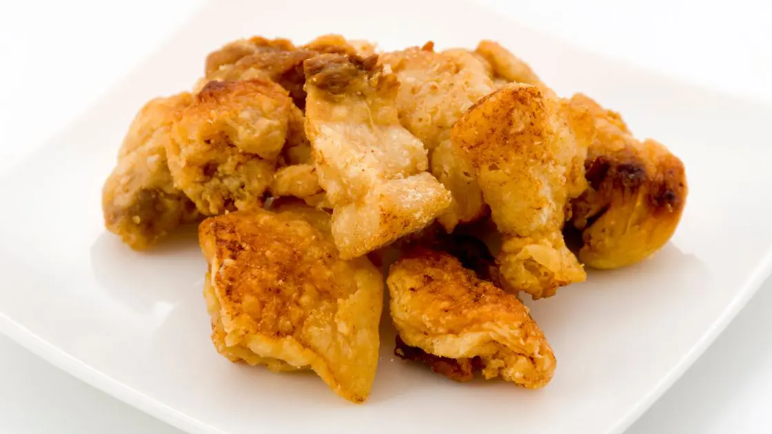 Air fryer pork scratchings on a white plate