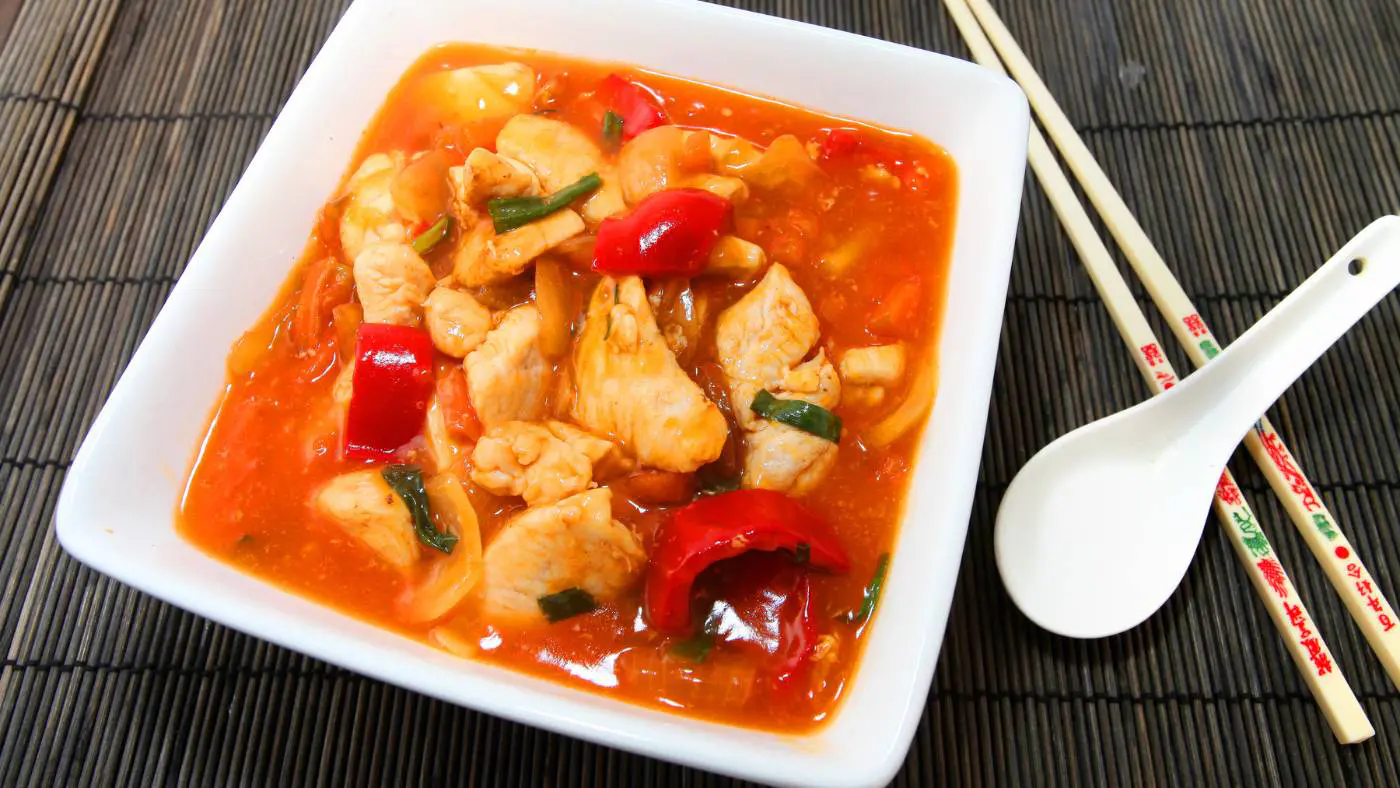 Air Fryer Sweet And Sour Chicken In A White Bowl