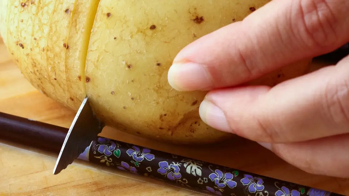 Chopsticks to help cut hasselback potatoes